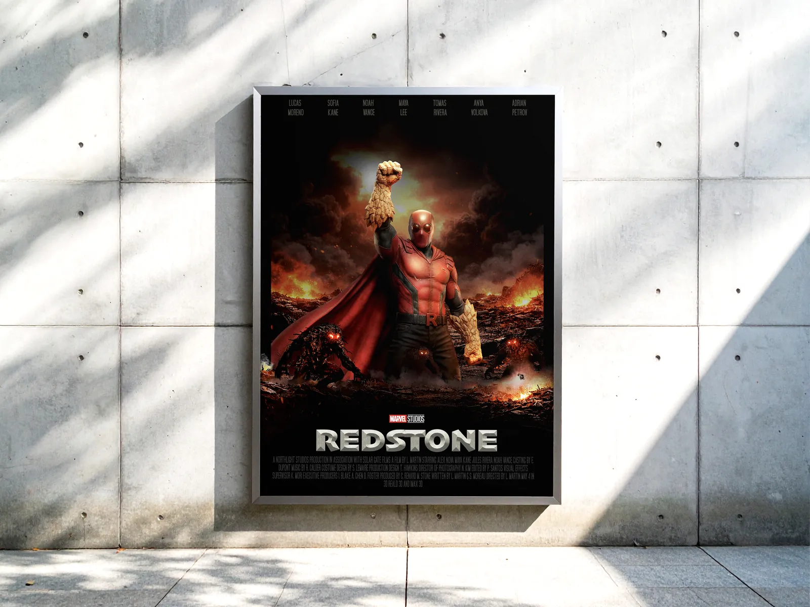 L'affiche Redstone accrochée sur un mur de béton.